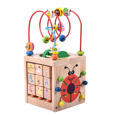 Image of Wooden children's puzzle beetle surrounded by large beads