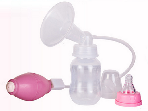 Image of Women Feeding Manual Breast Pump