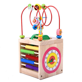 Wooden children's puzzle beetle surrounded by large beads